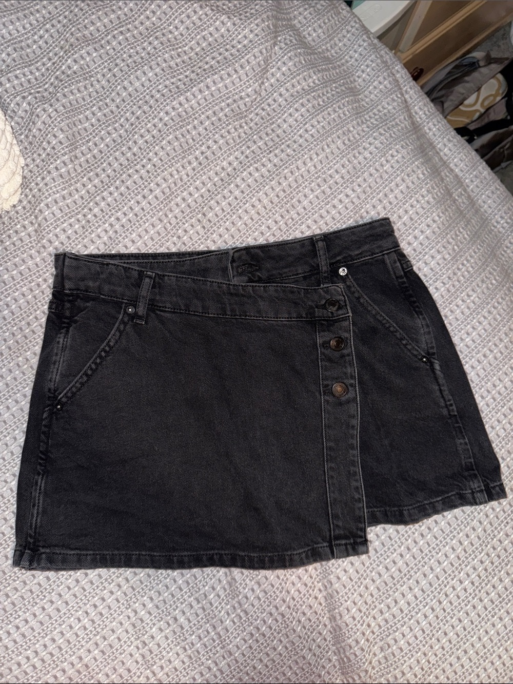 We The Free Black Denim Mini Skirt with Asymmetrical Button Detail